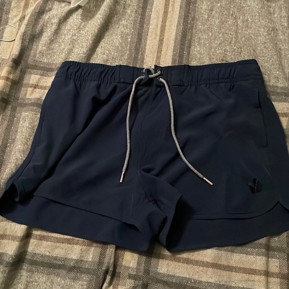 Hapari cover up shorts with pockets.
